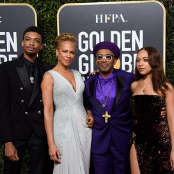 Image of the Lee family on the Golden Globes red carpet.