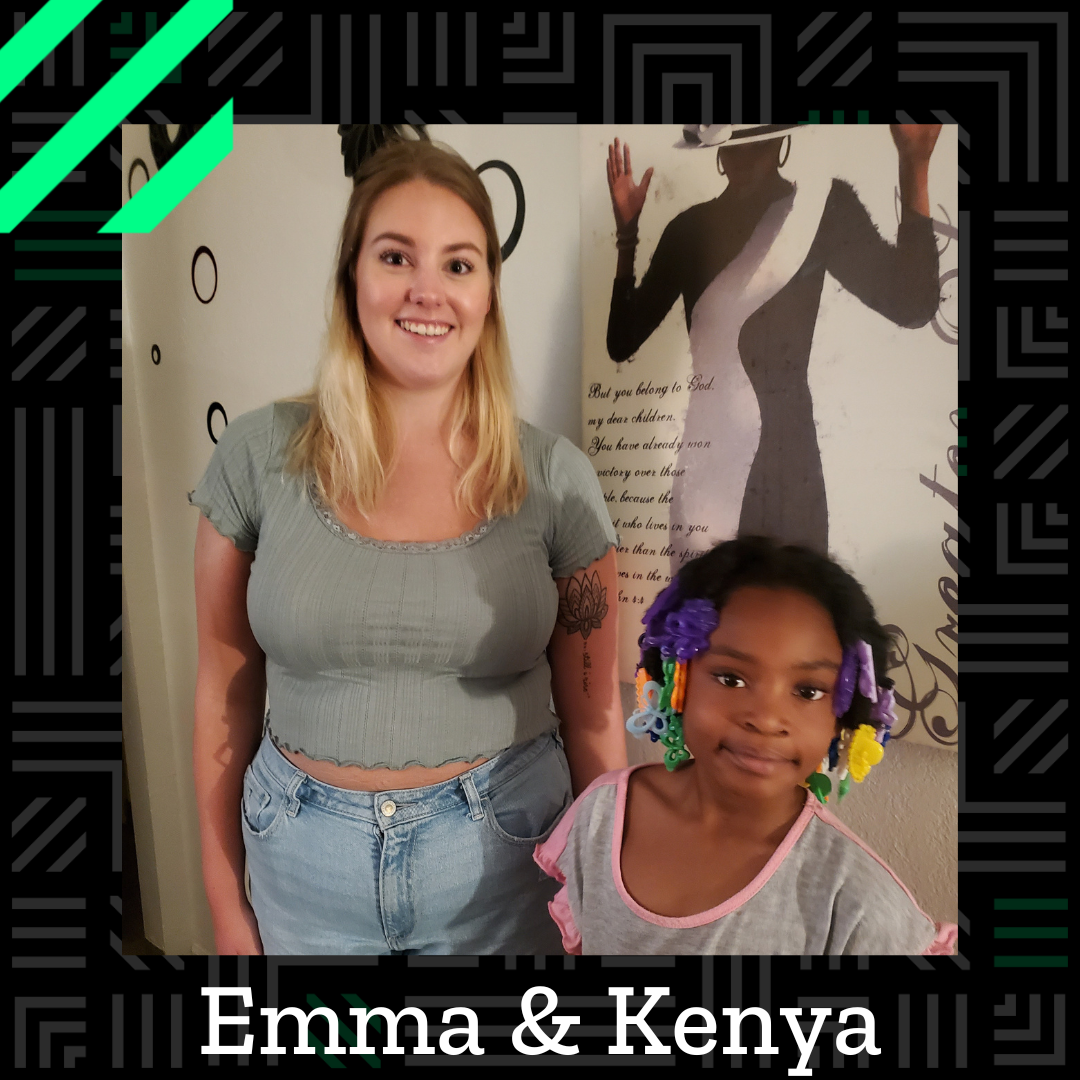 Emma and Kenya stand next to each other, looking at the camera.