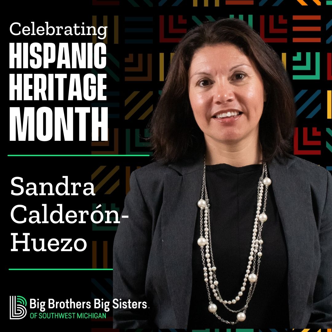 On the left: Celebrating Hispanic Heritage Month | Sandra Calderón-Huezo | the horizontal BBBS logo. On the right is a picture of Sandra, smiling at the camera.