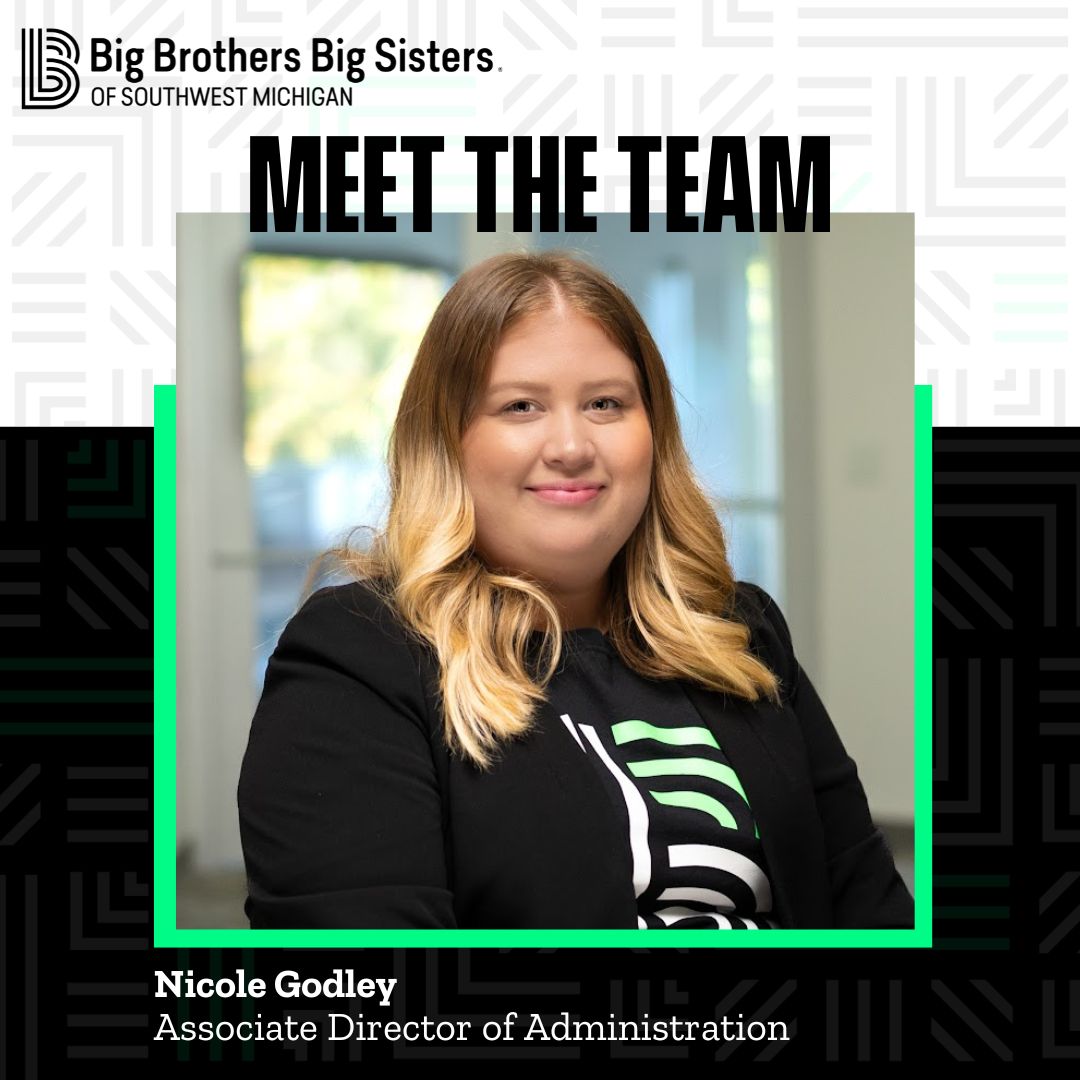 Upper left hand corner: The all-black horizontal BBBSMI logo. In the center is a headshot of Nicole Godley, smiling at the camera, wearing a black blazer and BBBS logo shirt. Above her are the words "Meet the Team." In the lower left hand corner are the words "Nicole Godley, Associate Director of Administration"