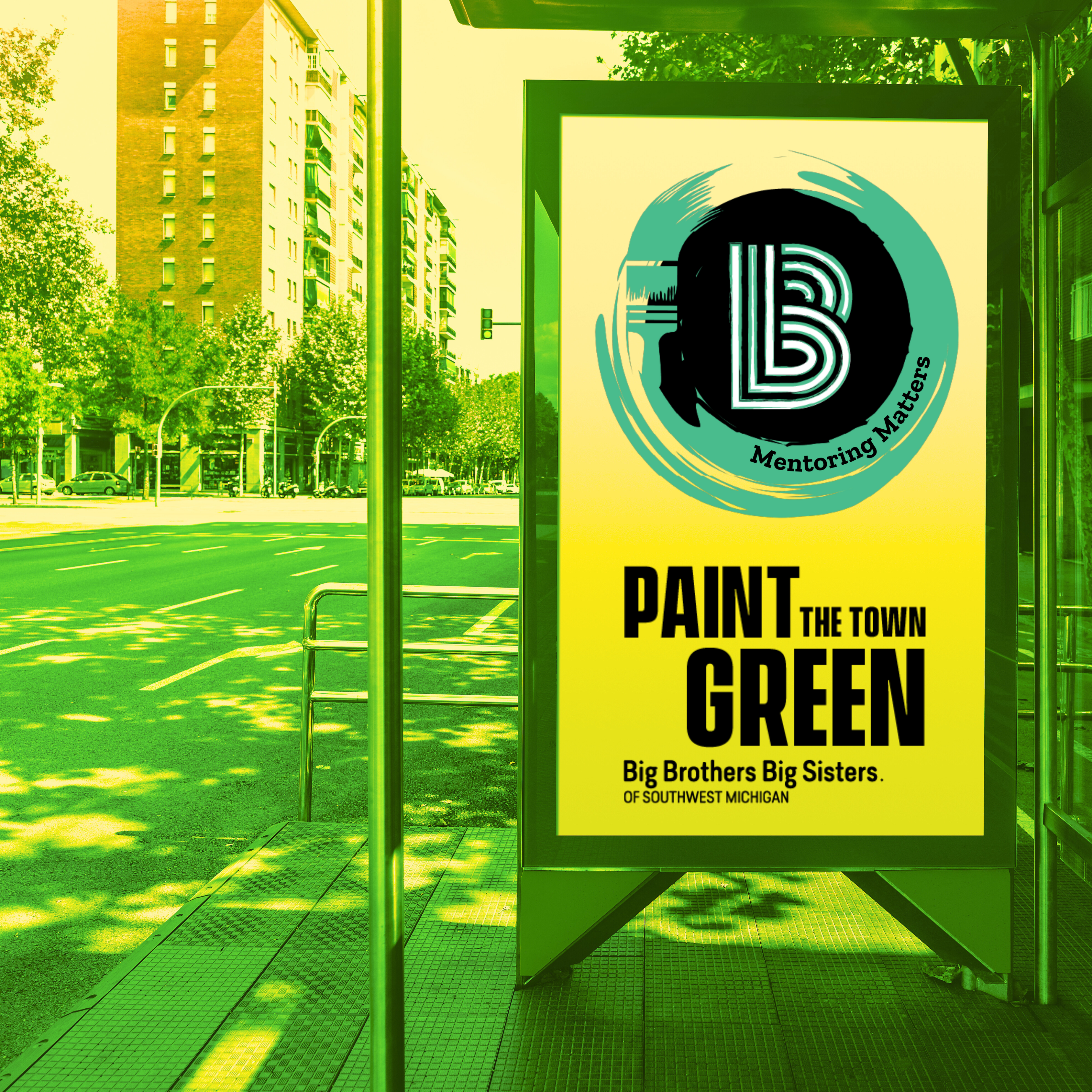 A photo of the Paint The Town Green logo at a bus stop